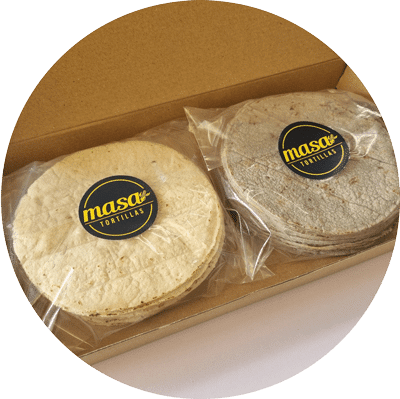 two packs of tortillas in a box